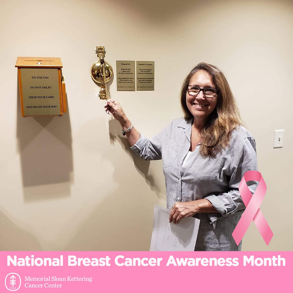 Tina Kadolph ringing the cancer-free bell